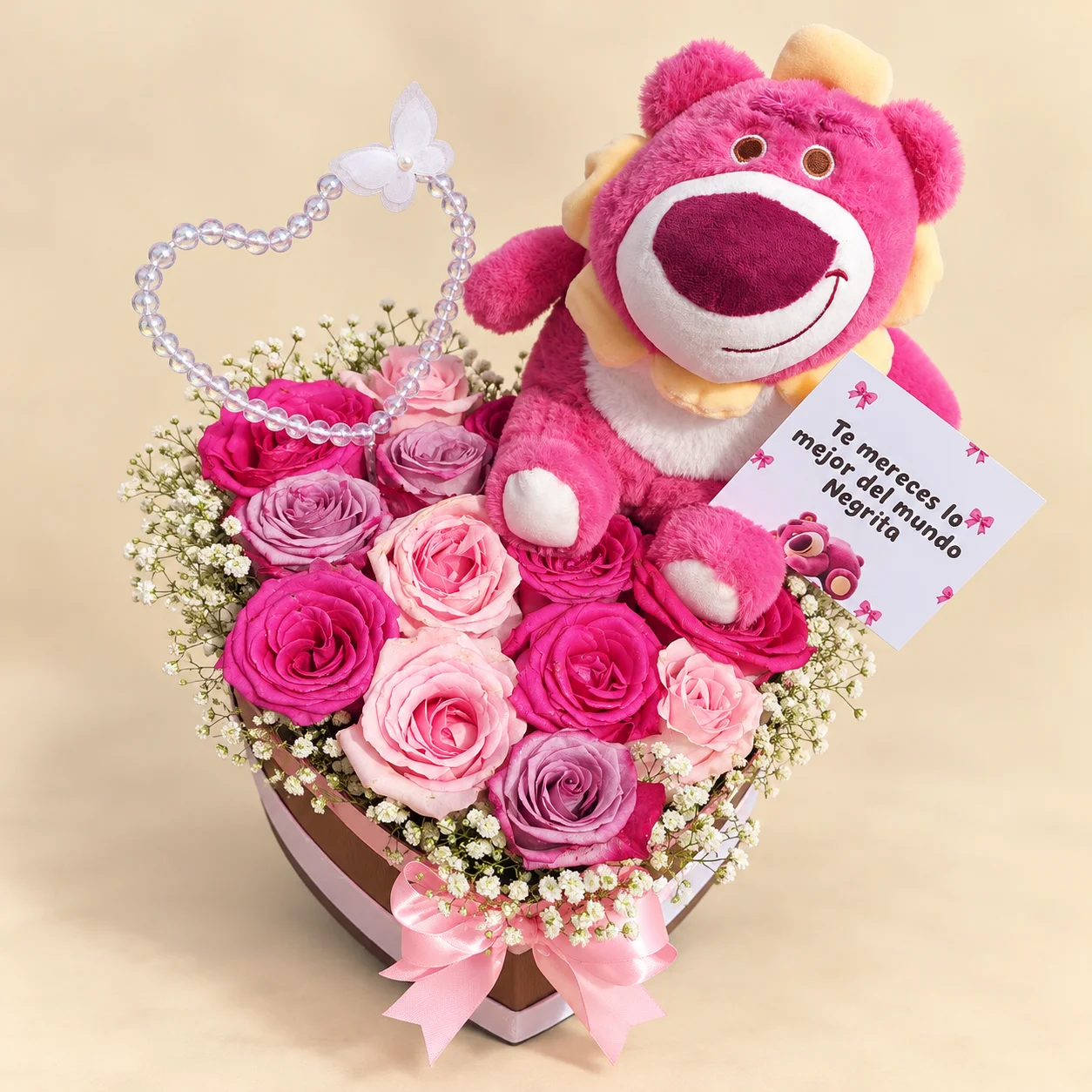 Caja Osito Rosado - 12 rosas en tonos rosa y lila con peluche de oso en caja corazón
